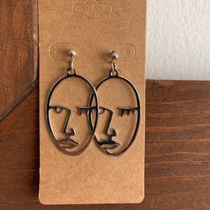 Brand New Winking Face Surrealist Earrings